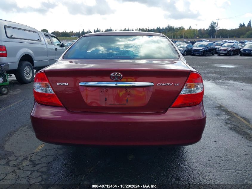 2002 Toyota Camry Le VIN: JTDBE32K420064927 Lot: 40712454