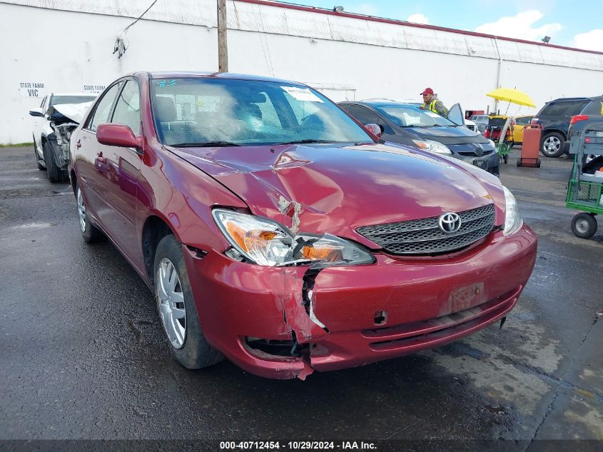 2002 Toyota Camry Le VIN: JTDBE32K420064927 Lot: 40712454