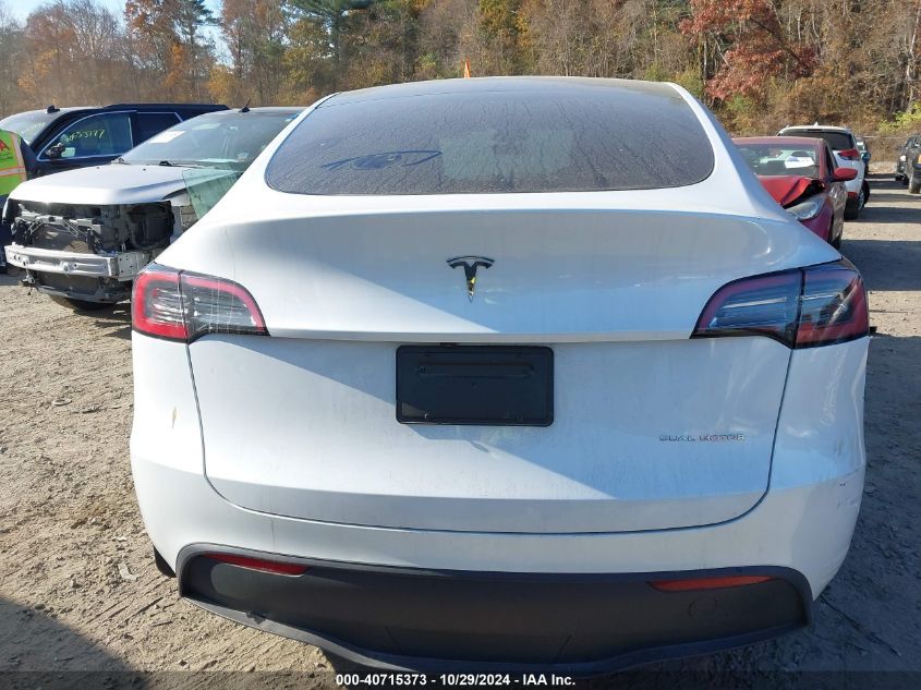 2023 Tesla Model Y Awd/Long Range Dual Motor All-Wheel Drive VIN: 7SAYGDEEXPF876275 Lot: 40715373