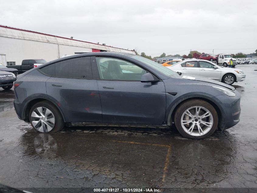 2023 Tesla Model Y Awd/Long Range Dual Motor All-Wheel Drive VIN: 7SAYGDEE9PF674690 Lot: 40719127