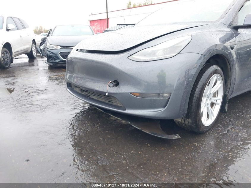 2023 Tesla Model Y Awd/Long Range Dual Motor All-Wheel Drive VIN: 7SAYGDEE9PF674690 Lot: 40719127