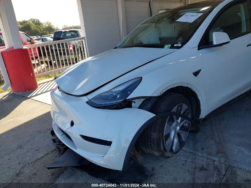 2023 Tesla Model Y Awd/Long Range Dual Motor All-Wheel Drive VIN: 7SAYGAEE9PF896466 Lot: 40724043