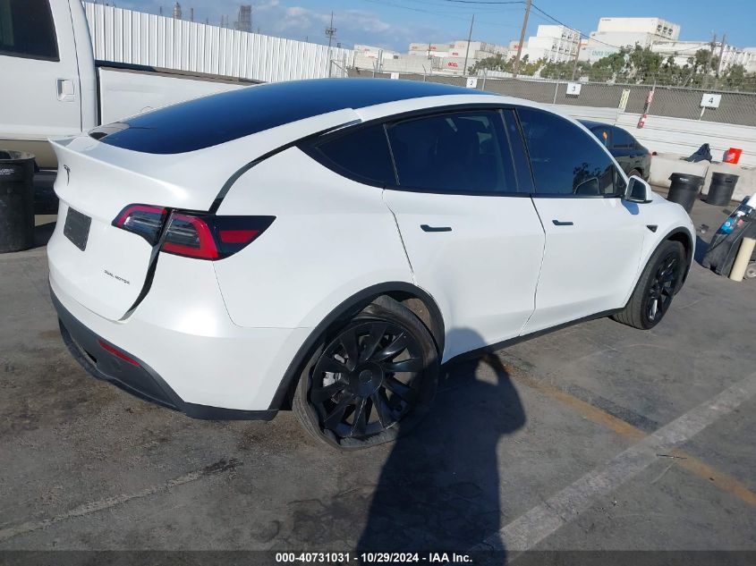 VIN 7SAYGDEE5PA059485 2023 TESLA MODEL Y no.4