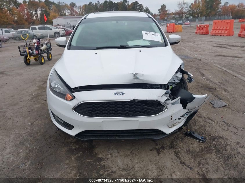 VIN 1FADP3H2XJL299877 2018 Ford Focus, Sel no.12