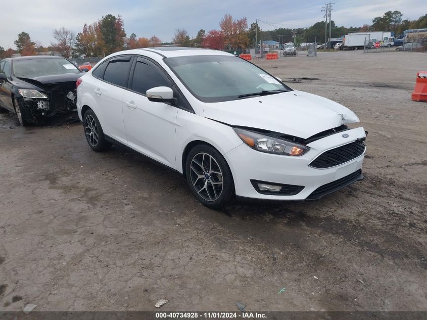 VIN 1FADP3H2XJL299877 2018 Ford Focus, Sel no.1