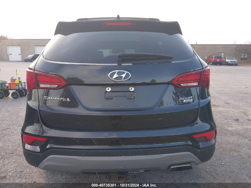 2018 Hyundai Santa Fe Sport 2.4L VIN: 5NMZUDLBXJH099699 Lot: 40735301