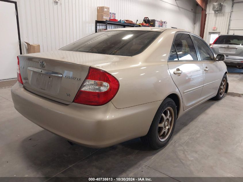 2002 Toyota Camry Le V6 VIN: 4T1BF30KX2U034402 Lot: 40738613