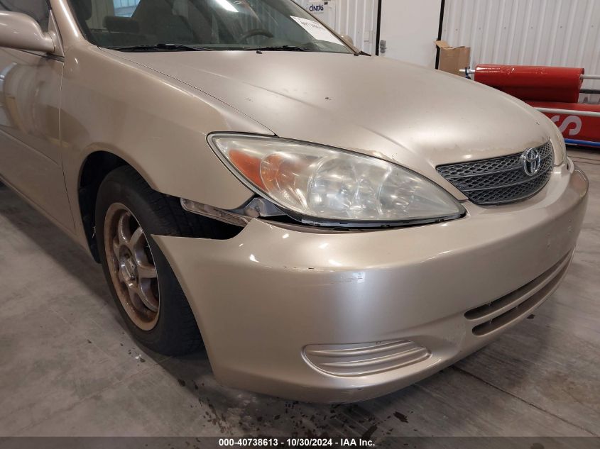 2002 Toyota Camry Le V6 VIN: 4T1BF30KX2U034402 Lot: 40738613