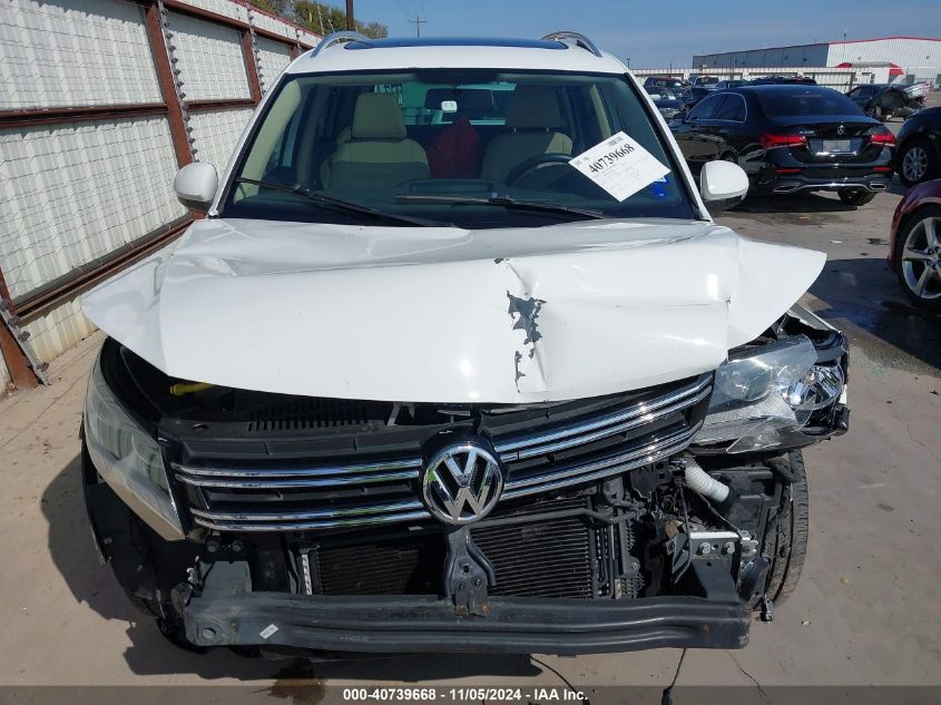 2014 Volkswagen Tiguan Sel VIN: WVGAV3AXXEW561728 Lot: 40739668