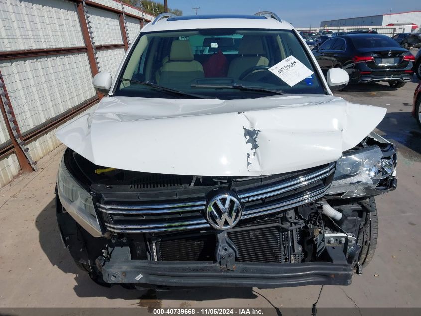 2014 Volkswagen Tiguan Sel VIN: WVGAV3AXXEW561728 Lot: 40739668