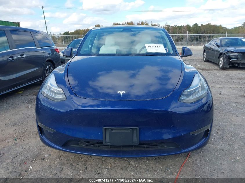 2023 Tesla Model Y Awd/Long Range Dual Motor All-Wheel Drive VIN: 7SAYGDEE5PA090946 Lot: 40741277