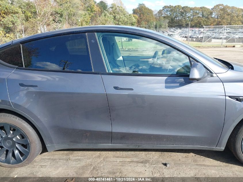 2023 Tesla Model Y Awd/Long Range Dual Motor All-Wheel Drive VIN: 7SAYGDEE1PF698207 Lot: 40741461