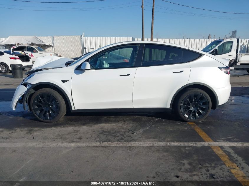 2023 Tesla Model Y Awd/Long Range Dual Motor All-Wheel Drive VIN: 7SAYGDEE6PA071368 Lot: 40741672