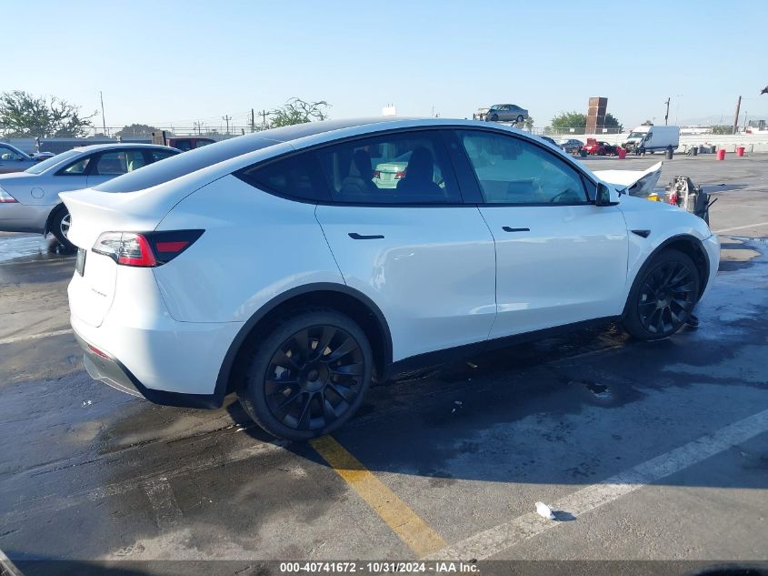 VIN 7SAYGDEE6PA071368 2023 Tesla Model Y, Awd/Long... no.4