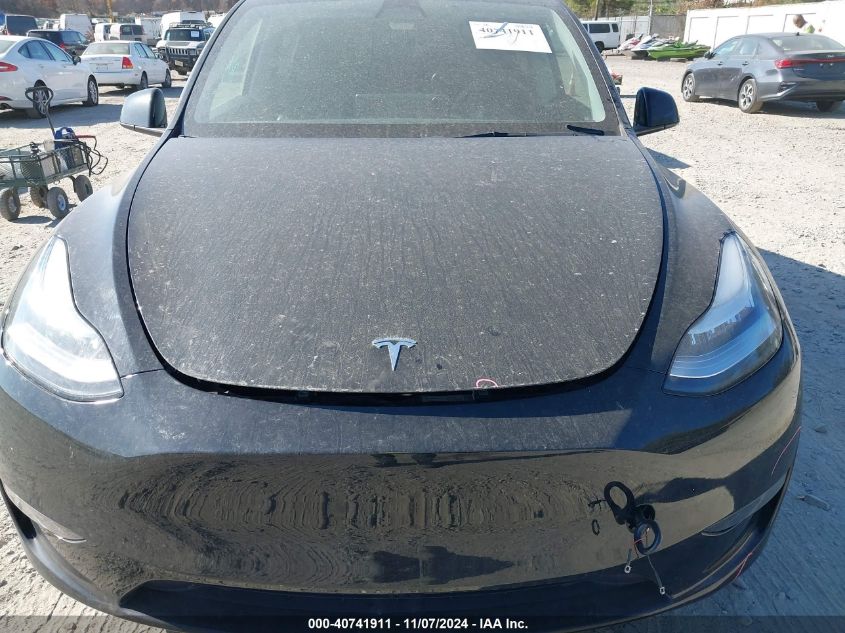 2023 Tesla Model Y Awd/Long Range Dual Motor All-Wheel Drive VIN: 7SAYGAEE7PF613000 Lot: 40741911