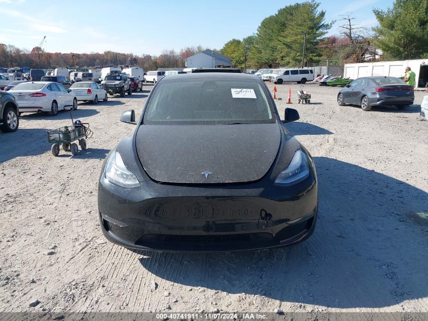 2023 Tesla Model Y Awd/Long Range Dual Motor All-Wheel Drive VIN: 7SAYGAEE7PF613000 Lot: 40741911