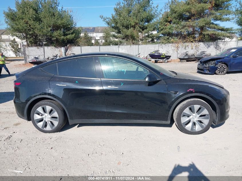 2023 Tesla Model Y Awd/Long Range Dual Motor All-Wheel Drive VIN: 7SAYGAEE7PF613000 Lot: 40741911