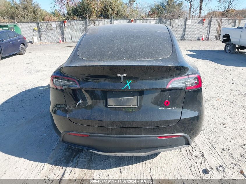 2023 Tesla Model Y Awd/Long Range Dual Motor All-Wheel Drive VIN: 7SAYGAEE7PF613000 Lot: 40741911