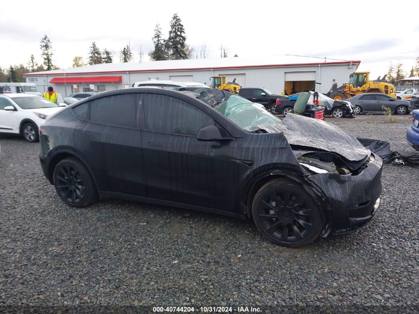 2023 Tesla Model Y Awd/Long Range Dual Motor All-Wheel Drive VIN: 7SAYGAEE8PF838946 Lot: 40744204