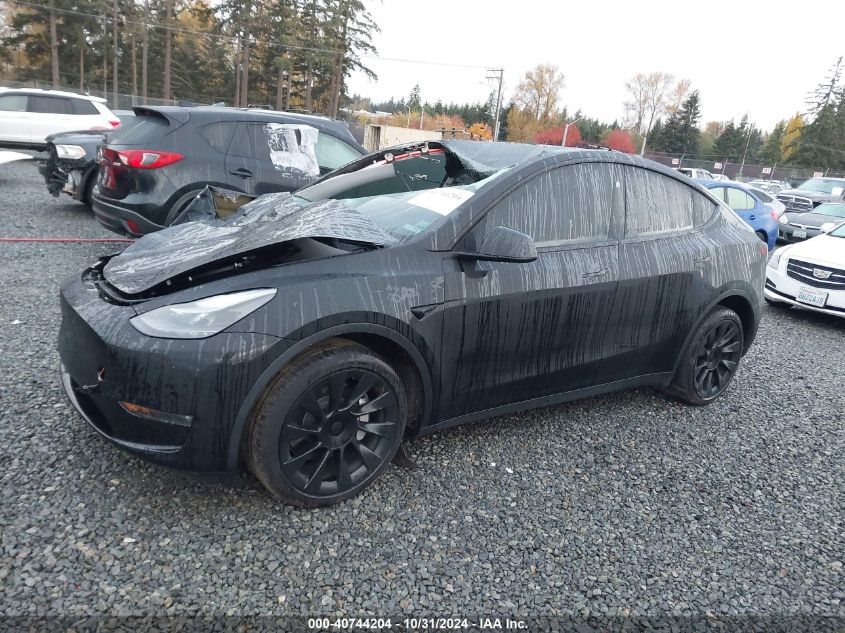 2023 Tesla Model Y Awd/Long Range Dual Motor All-Wheel Drive VIN: 7SAYGAEE8PF838946 Lot: 40744204