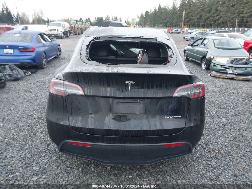 2023 Tesla Model Y Awd/Long Range Dual Motor All-Wheel Drive VIN: 7SAYGAEE8PF838946 Lot: 40744204