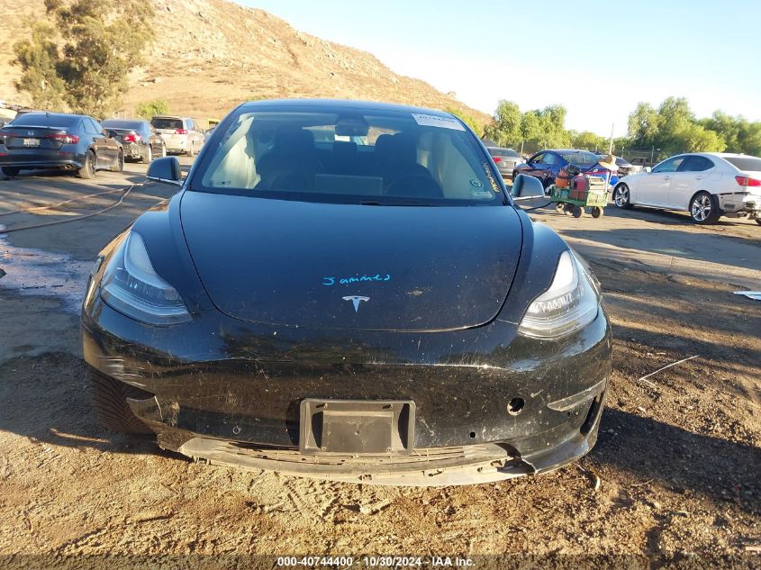 2018 Tesla Model 3 Long Range/Mid Range VIN: 5YJ3E1EA2JF172748 Lot: 40744400