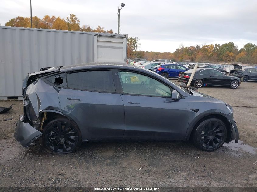 2023 Tesla Model Y Awd/Long Range Dual Motor All-Wheel Drive VIN: 7SAYGDEE4PF689677 Lot: 40747213