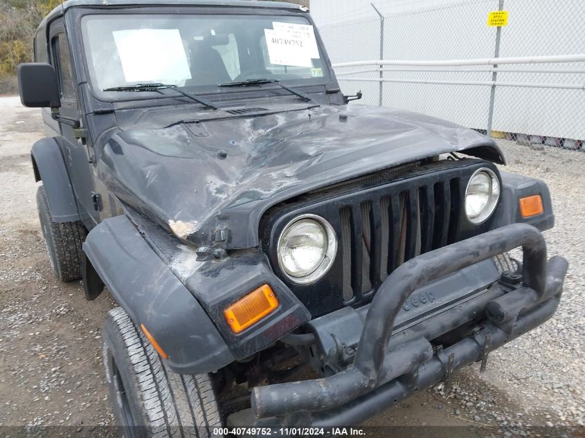 2000 Jeep Wrangler Se VIN: 1J4FA29P7YP704843 Lot: 40749752