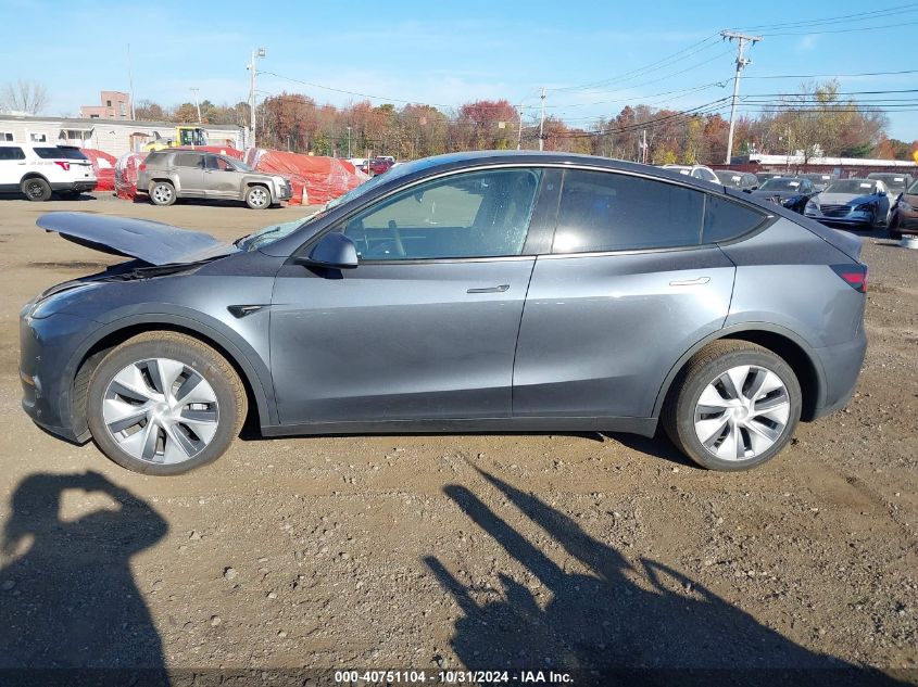 2023 Tesla Model Y Awd/Long Range Dual Motor All-Wheel Drive VIN: 7SAYGDEE5PA106501 Lot: 40751104