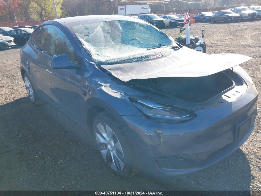 2023 Tesla Model Y Awd/Long Range Dual Motor All-Wheel Drive VIN: 7SAYGDEE5PA106501 Lot: 40751104