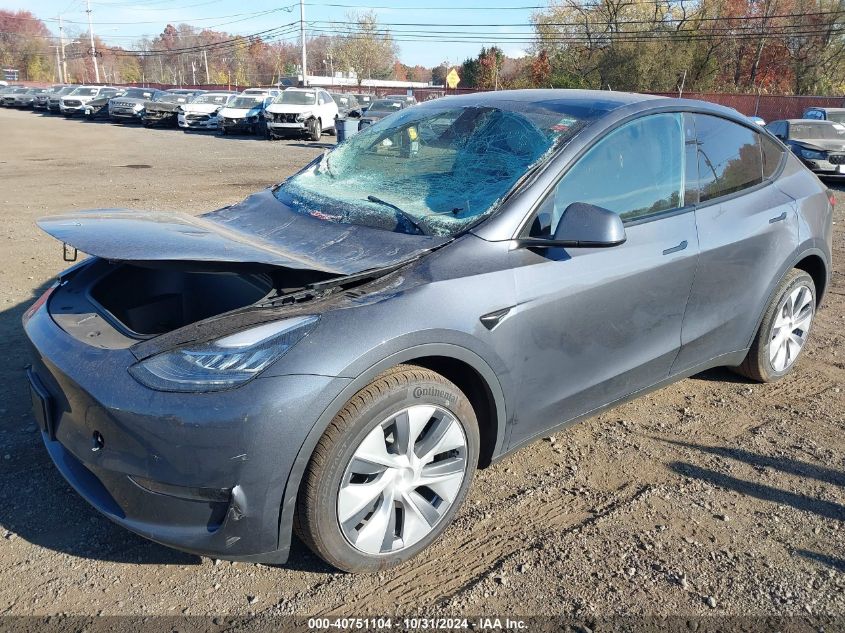 2023 Tesla Model Y Awd/Long Range Dual Motor All-Wheel Drive VIN: 7SAYGDEE5PA106501 Lot: 40751104