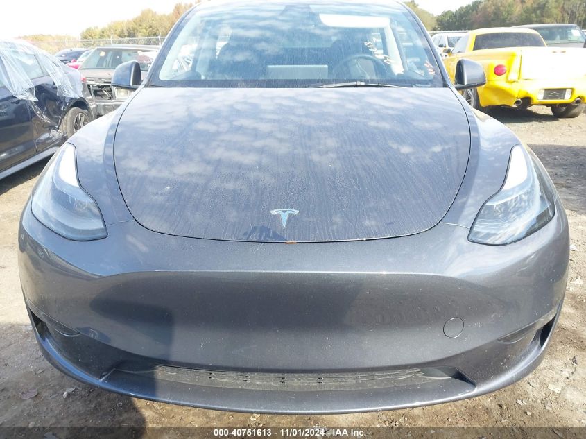 2023 Tesla Model Y Awd/Long Range Dual Motor All-Wheel Drive VIN: 7SAYGDEE9PA163302 Lot: 40751613