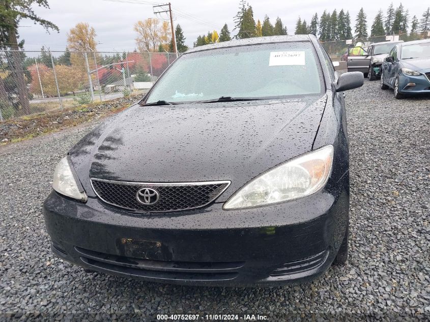 2002 Toyota Camry Le VIN: 4T1BE32K12U068129 Lot: 40752697