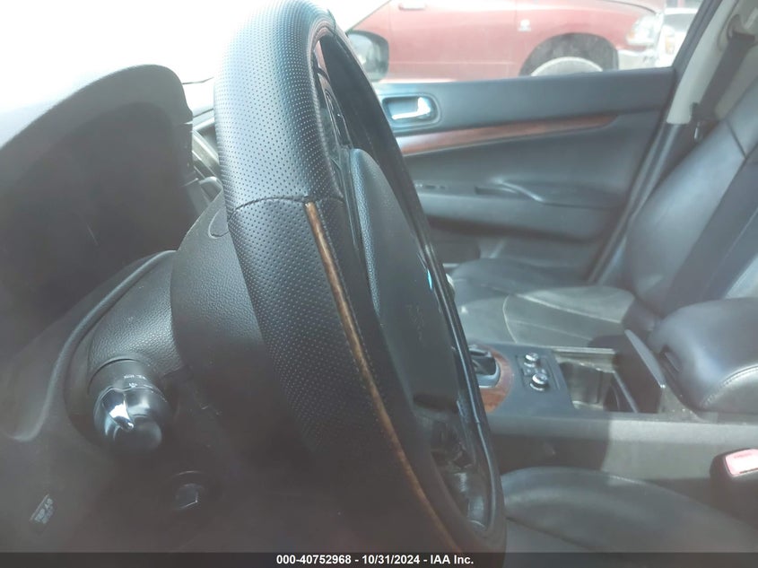 2009 INFINITI G37X VIN: JNKCV61F29M356765