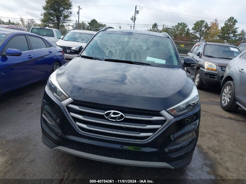 2018 Hyundai Tucson Value VIN: KM8J33A22JU810653 Lot: 40754361