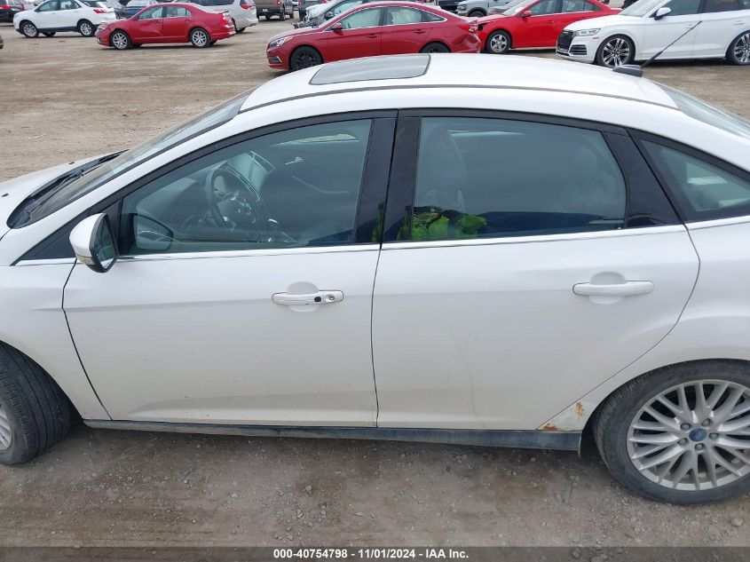 2014 Ford Focus Titanium VIN: 1FADP3J25EL128213 Lot: 40754798