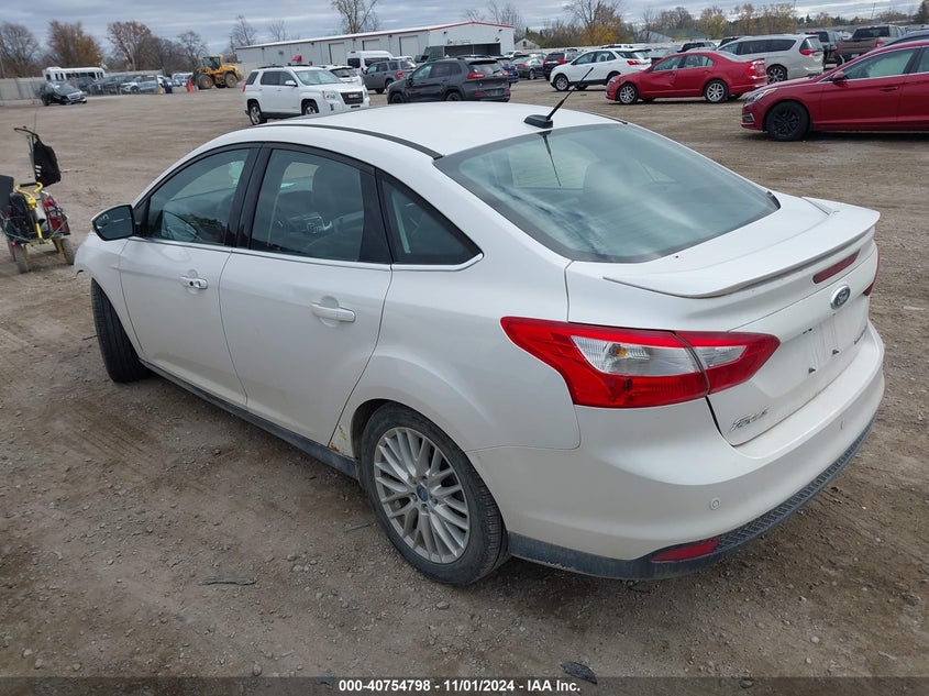 2014 FORD FOCUS TITANIUM - 1FADP3J25EL128213