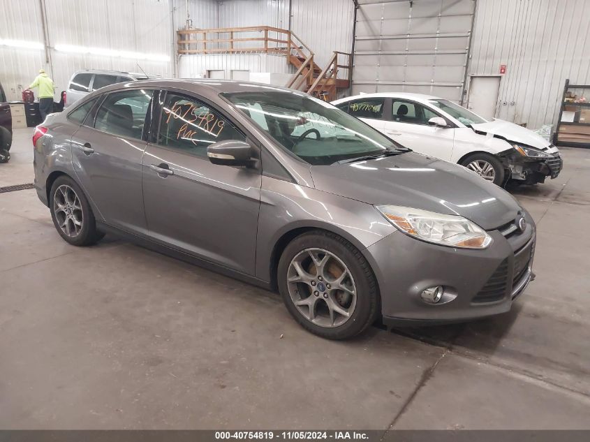 VIN 1FADP3F26EL209875 2014 FORD FOCUS no.1