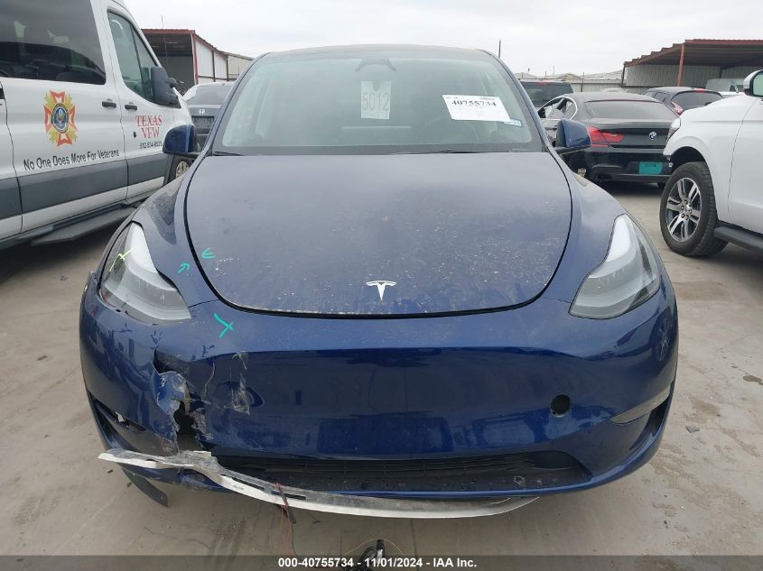 2024 Tesla Model Y Long Range Dual Motor All-Wheel Drive VIN: 7SAYGAEE7RF102521 Lot: 40755734