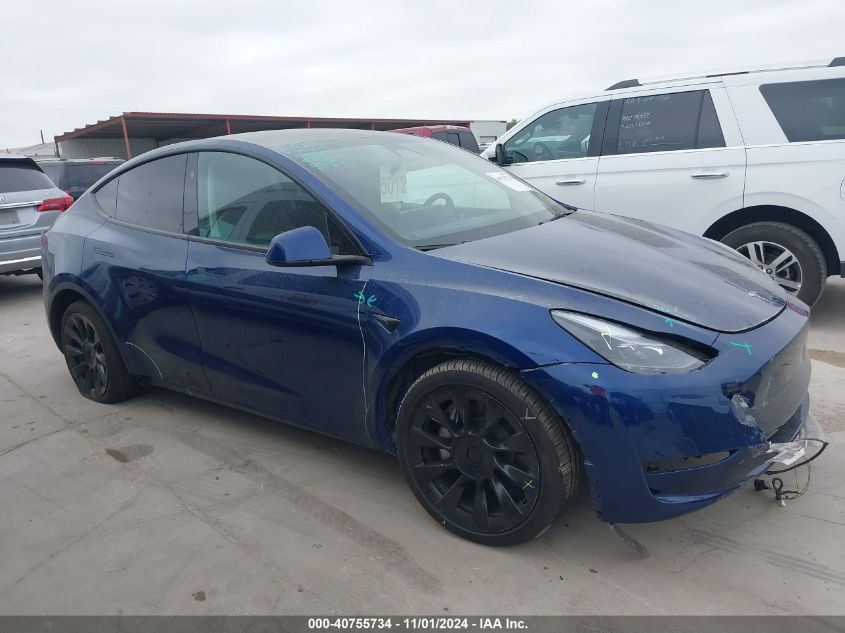 2024 Tesla Model Y Long Range Dual Motor All-Wheel Drive VIN: 7SAYGAEE7RF102521 Lot: 40755734