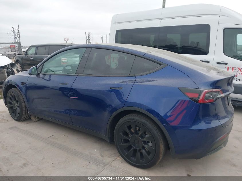 2024 Tesla Model Y Long Range Dual Motor All-Wheel Drive VIN: 7SAYGAEE7RF102521 Lot: 40755734