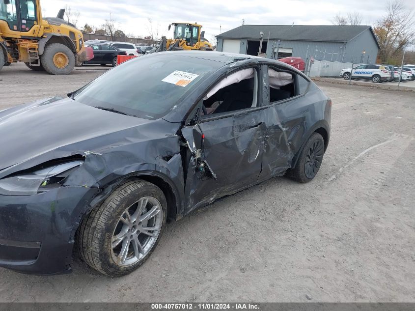 2024 Tesla Model Y Long Range Dual Motor All-Wheel Drive VIN: 7SAYGDEE0RA228301 Lot: 40757012