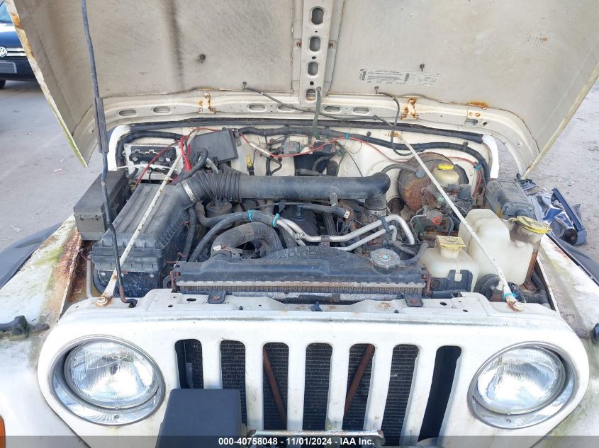 2000 Jeep Wrangler Sport VIN: 1J4FA49S5YP733614 Lot: 40758048