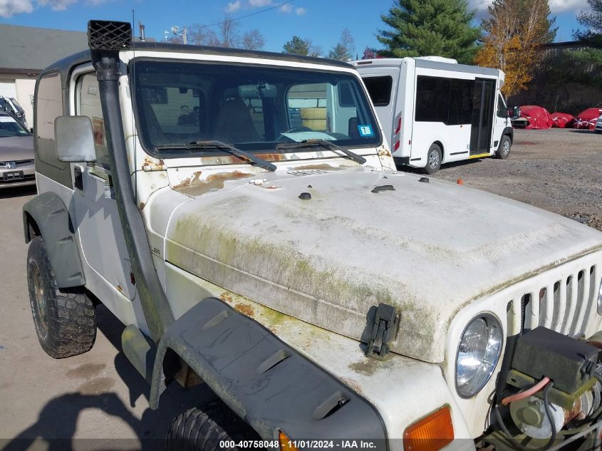 2000 Jeep Wrangler Sport VIN: 1J4FA49S5YP733614 Lot: 40758048