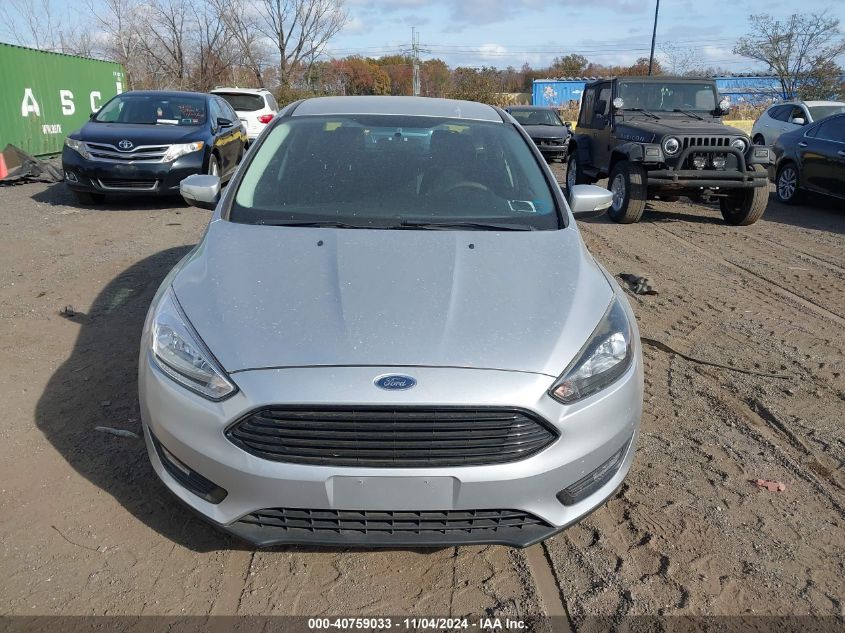 2018 Ford Focus Se VIN: 1FADP3FE2JL318418 Lot: 40759033