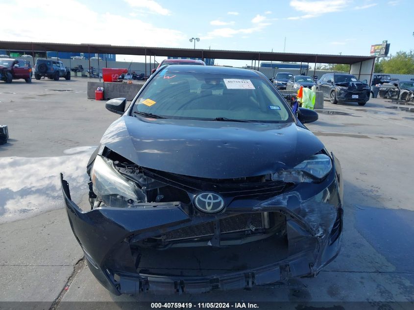 2018 Toyota Corolla Le VIN: 5YFBURHE9JP797695 Lot: 40759419