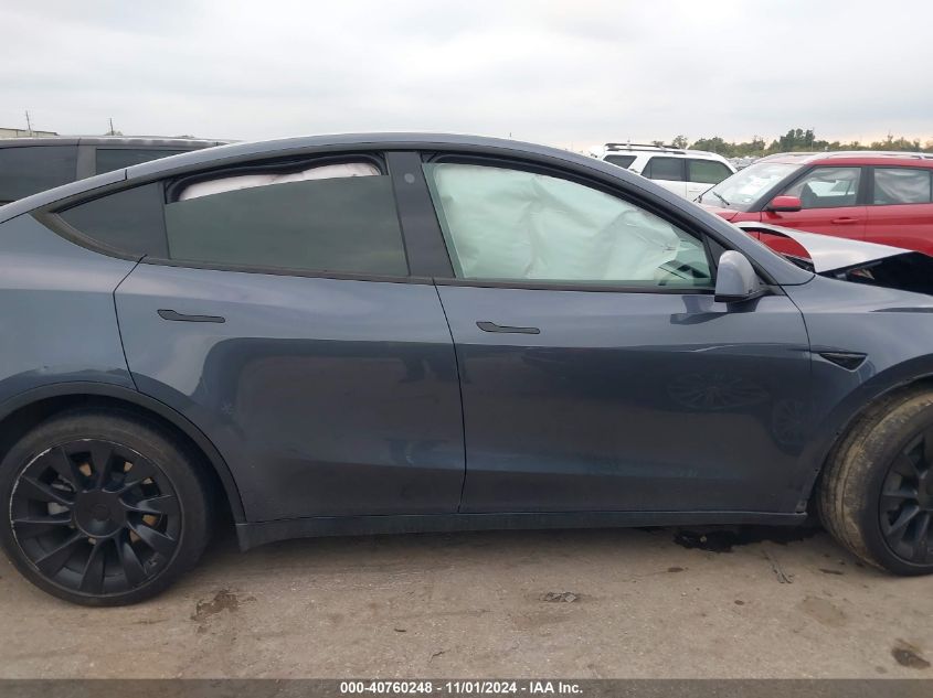 2023 Tesla Model Y Awd/Long Range Dual Motor All-Wheel Drive VIN: 7SAYGAEE6PF630077 Lot: 40760248