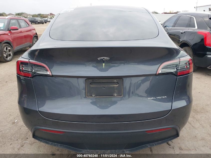 2023 Tesla Model Y Awd/Long Range Dual Motor All-Wheel Drive VIN: 7SAYGAEE6PF630077 Lot: 40760248