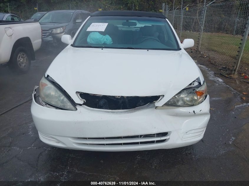 2002 Toyota Camry Le VIN: 4T1BE32K02U031122 Lot: 40762639