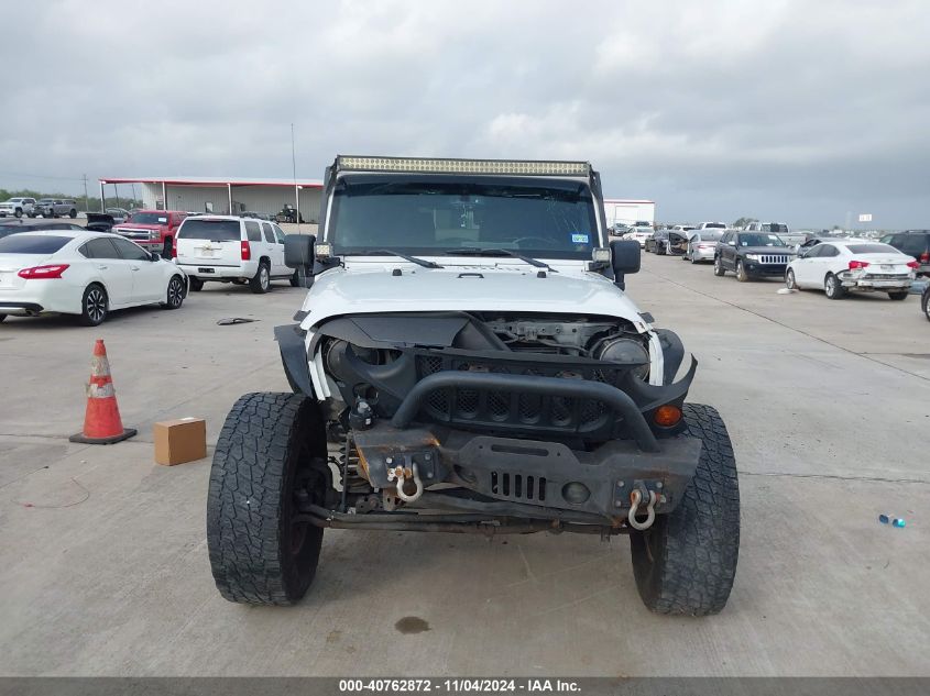 2013 Jeep Wrangler Sport VIN: 1C4GJWAGXDL670251 Lot: 40762872